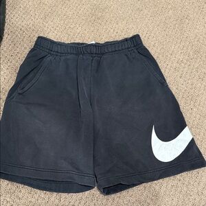Nike black sweatpant Shorts with White Swoosh
